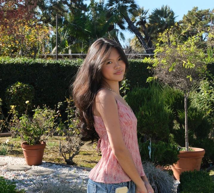 Alison Chan standing in a garden